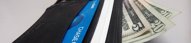 wallet with credit card and bills